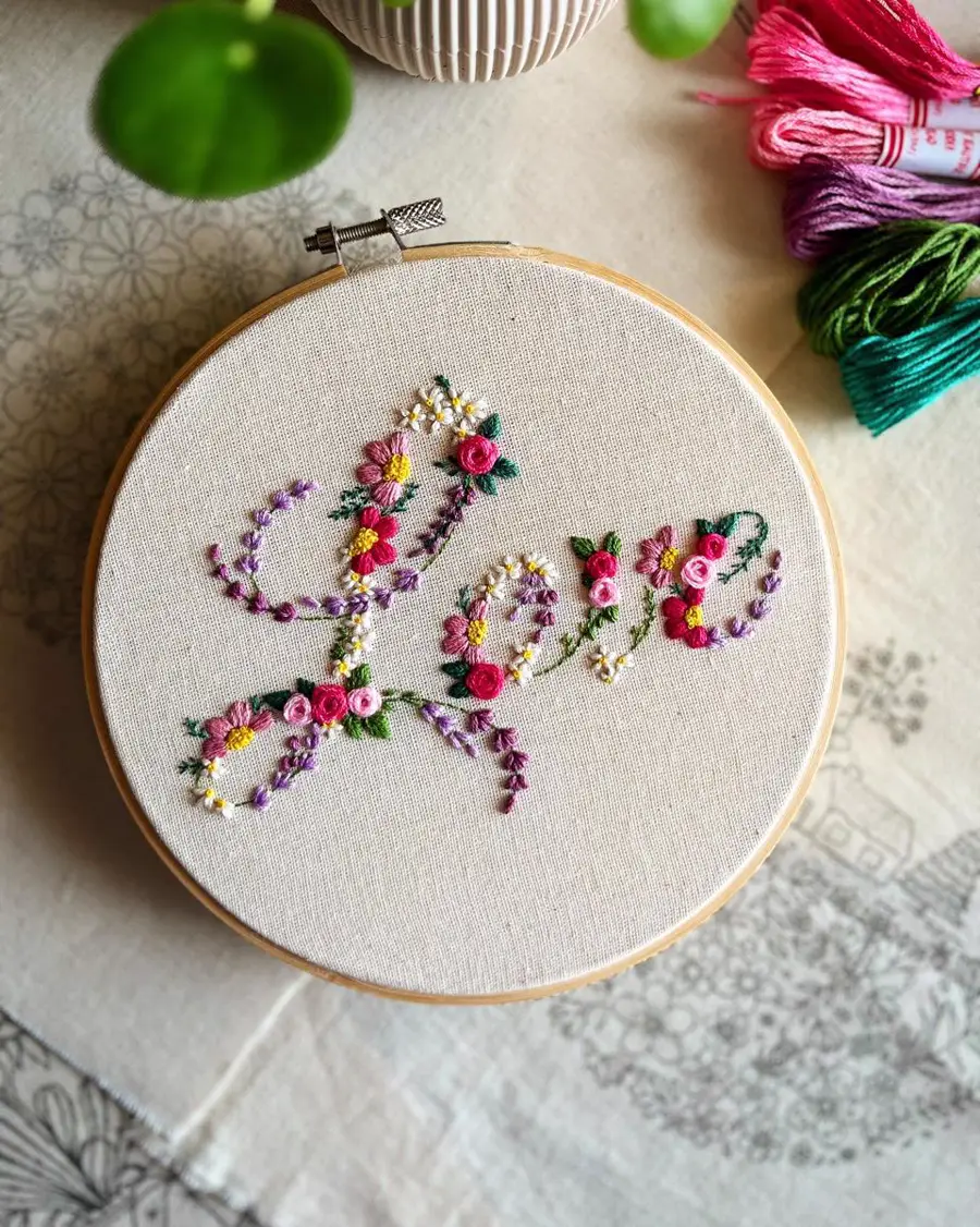 Love lettering with pink and lilac florals